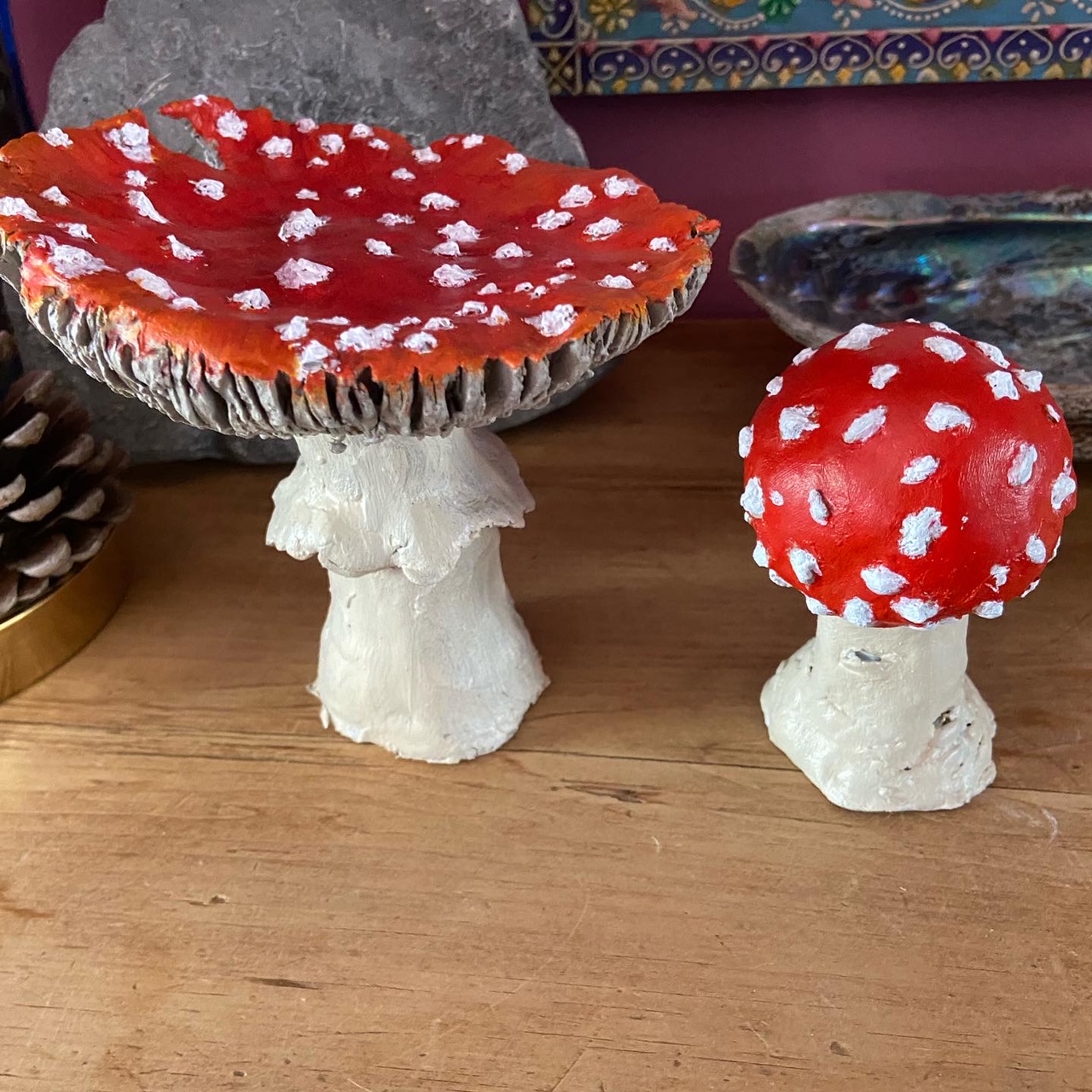 Two clay, painted Fly Agaric mushrooms by Betty Adamou